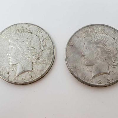 2614	

2 1923 Silver Peace Dollars
Philadelphia Mint