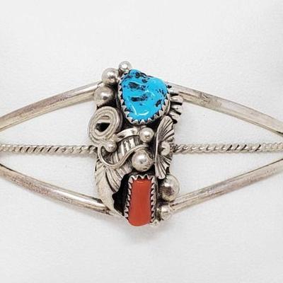 2046	

Max C Sterling Silver Turquoise and Coral Cuff Bracelet- 13.4g
Weighs Approx 13.4g
Genuine Kingman Turquoise and Branch Coral...