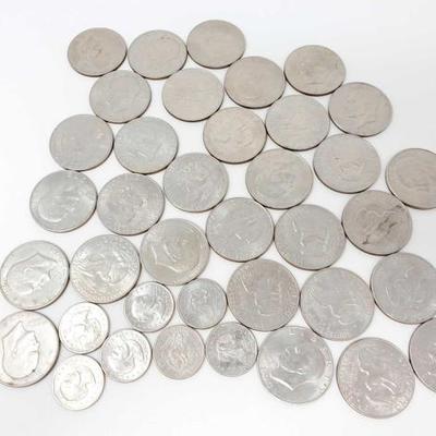 2720	

Approx 31 Eisenhower Dollars And 7 Susan B Anthony Dollars
Approx 31 Eisenhower Dollars And 7 Susan B Anthony Dollars