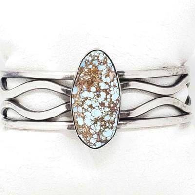 2008	

Sterling Silver Cuff Bracelet With Turquoise Stone, 36.2g
Weighs Approx 32.2g