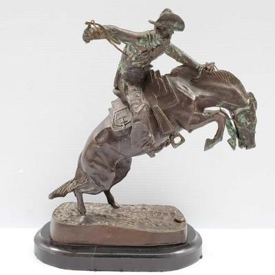228	

Bronze Sculpture By Frederic Remington
Measures Approx: 11.5