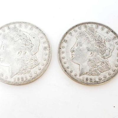 2574	

2 1921-D Morgan Silver Dollars
Denver Mint