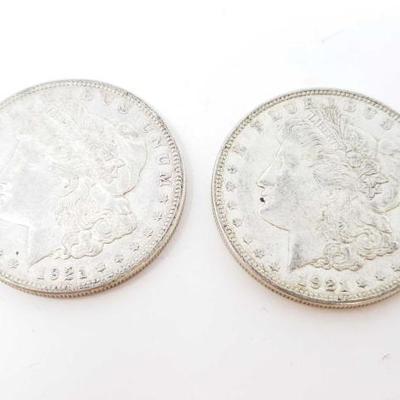 2564	

2 1921-D Morgan Silver Dollars
Denver Mint