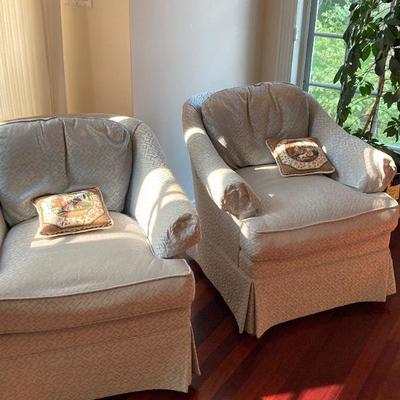 pair of upholstered arm chairs