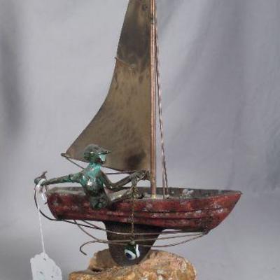 Custom made onyx, bronze & brass sculpture of boy in sailboat