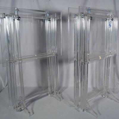 Four modern lucite tv trays