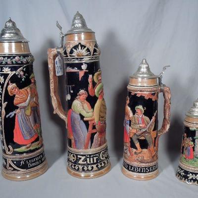 Group of four German steins