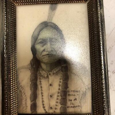 Etching ( scrimshaw style)of Sitting Bull on porcelain. 
Local artist JL Wimsatt