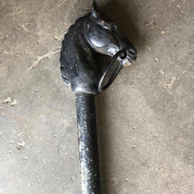 Antique cast iron horse hitching post