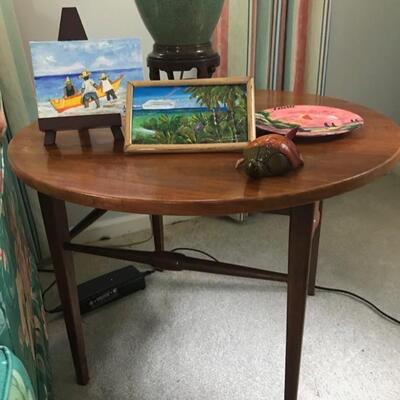 mid century round end table $195
27 X 20"
painting with fisherman SOLD