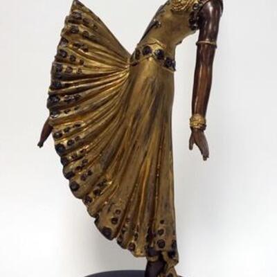 1021	ERTE STYLE BRONZE OF AN ART DECO DANCING GIRL ON A MARBLE BASE, 27 1/2 IN HIGH

