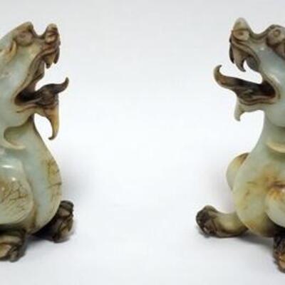 1027	PAIR OF STONE CARVED ASIAN DRAGONS, 10 IN LONG X 7 1/2 IN HIGH
