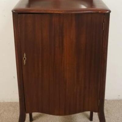 1033	1 DOOR MAHOGANY SHEET MUSIC STAND WITH OVAL MIRROR
