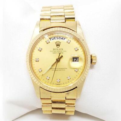 736	
Rolex Watch - Not Authenticated
Rolex Watch - Not Authenticated
OS14-119879A.3 1/
