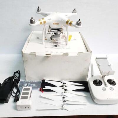 1208	
DJI Phantom 3 Professional Drone
Includes 8 Blades, Controller, Charger, Drone, Battery, And Bo