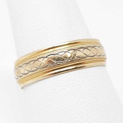 650	
14k Gold Band, 3.3g
Weighs Approx 3.3g Size 9
