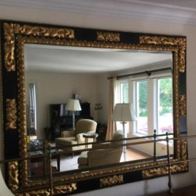 Beveled mirror 35x48 with gold & black frame.