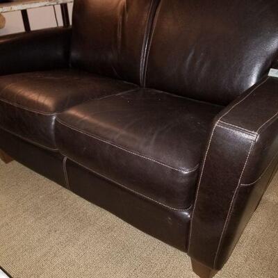 Like new. Love seat measures out 56