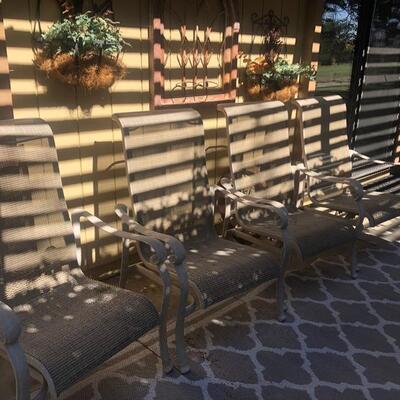 4 low chairs for sitting around a short table or fire pit - good condition and comfortable 