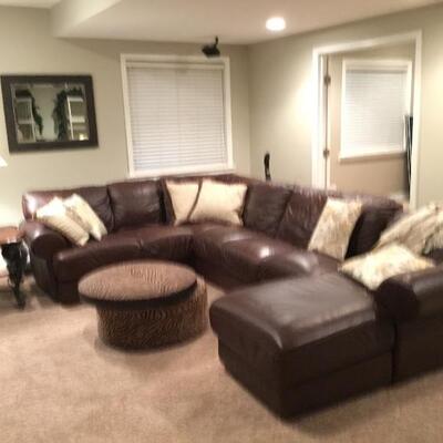 Leather sectional has been sold, but ottoman is still available.
