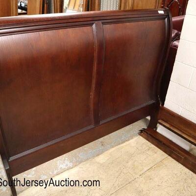
Lot 531
Contemporary mahogany queen size sleigh bed with rails
