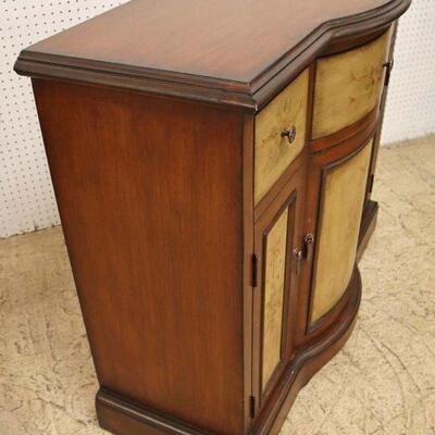 
Lot 504
Contemporary mahogany paint decorated 3 drawer 4 door credenza

