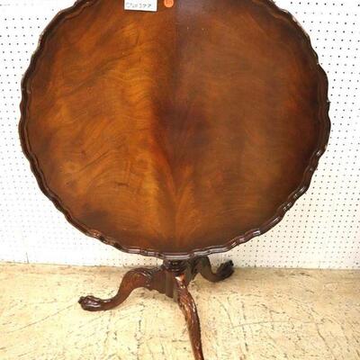 
Lot 517
QUALITY SOLID mahogany tilt top carved birdcage base pie crust table
