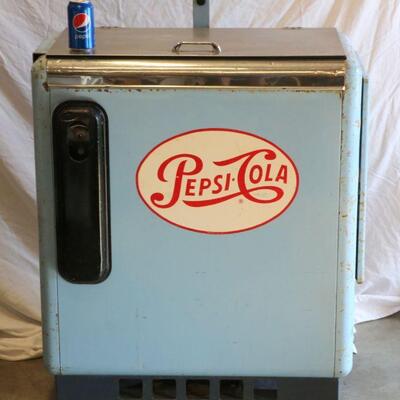 Working vintage Pepsi bottle dispenser.