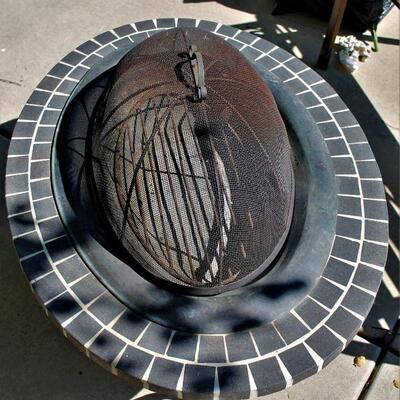 The perfect decorative fire pit for taking the chill off those crisp, mid-Autumn evenings.  Great condition.