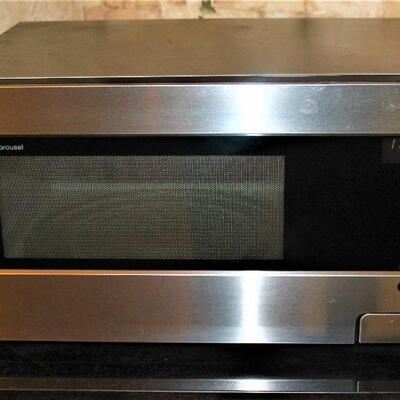 Sleek stainless steel microwave is in excellent condition.