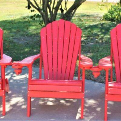 How cool are these three bright red Adirondack chairs?  Weather and fade resistant with drink holders also. 