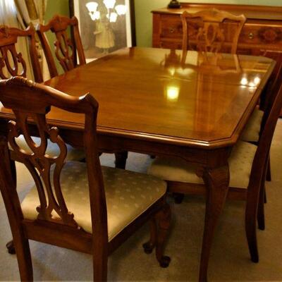 Beautiful solid wood formal dining set with six upholstered chairs make it easy and comfortable to sit and visit long after dinner has...