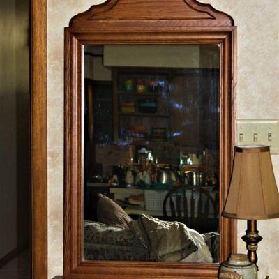 Wood framed mirror.