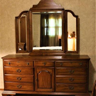 Matching twelve drawer dresser has a dual fold mirror so you'll always be able to capture your best side.