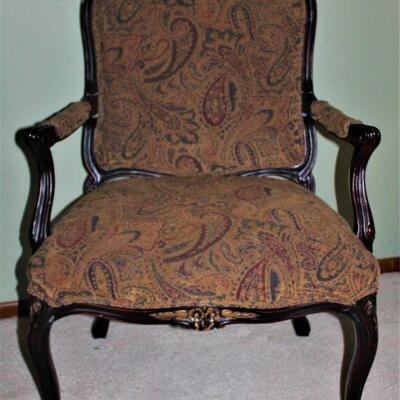 Upholstered Queen Anne styled chair.