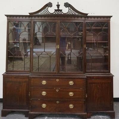 1074	4257	LARGE MAHOGANY ANTIQUE BREAKFRONT CHINA CABINET	LARGE MAHOGANY ANTIQUE BREAKFRONT CHINA CABINET HAS A BROKEN ARCH FRETWORK TOP...
