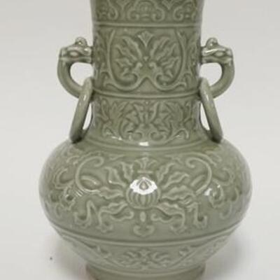 1044	5031	DECORATED CELADON VASE	DECORATED CELADON VASE HAS AN EMBOSSED DECORATION W/ DRAGON HEAD & RING HANDLES 12 IN H 	50	100	25...