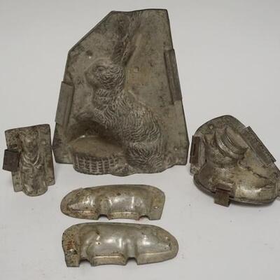 1073	5031	LOT OF 4 CHOCOLATE MOLDS	LOT OF FOUR CHOCOLATE MOLDS; LARGE RABBIT, DUCKLING, A PIG & A SMALL DRESSED PIG LARGEST IS 8 1/4 IN H...