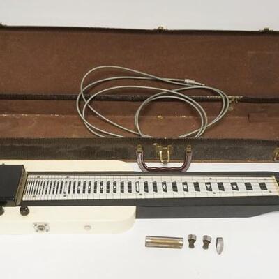 1055	5031	ELECTRIC STEEL GUITAR W/ CASE	ELECTRIC STEEL GUITAR W/ CASE THE TUNING KNOBS ARE DISTINTIGRATING HAS PICKS & A BAR 33 IN L 	100...