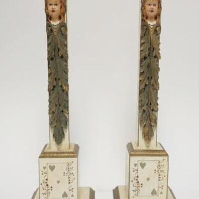 1062	5031	PAIR OF CARVED PAINTED WOODEN CANDLESTICKS	PAIR OF CARVED WOODEN CANDLESTICKS HAVE CARVED FACES & ARE DECORATED W/ CARD SUITES...