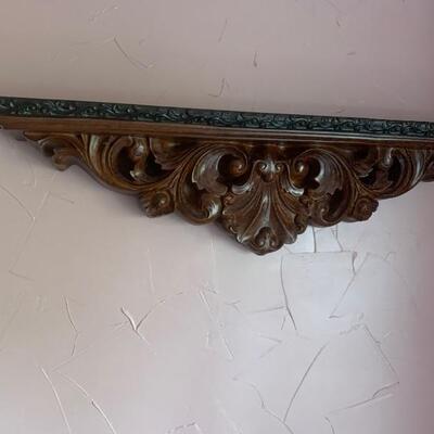 Carved wooden and marble wall shelf