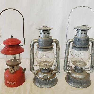458	

Pair of Matching Wizard Oil Lanterns and a Coleman Fuel Lantern