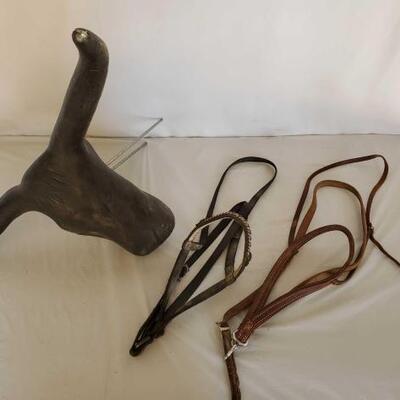 407	

Two Roper Tie Downs and a Steer Roping Head
Two Roper Tie Downs and a Steer Roping Head