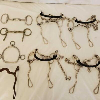 382	

8 Different Types of Bits
1- Training Bit Side Pull Stamped Made in England (See picture)

1- Snaffle Bit with Dog Bone Mouth...