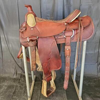 264	

Hereford Brand/Tex Tan of Yoakum Roping Saddle with Rawhide Trim
16 1/2