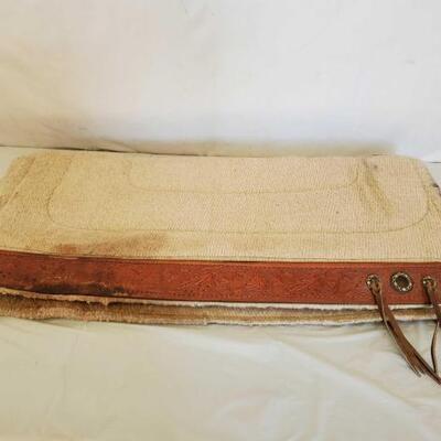 390	

2 Navajo Combination Pads
1- Red Navajo Pad Contoured Combination Pad 34x35 with tooled wear leathers with barbwire concho accents....