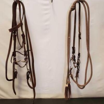 151	

Two Complete Cowboy Bridles
Two Used Complete Cowboy Bridles