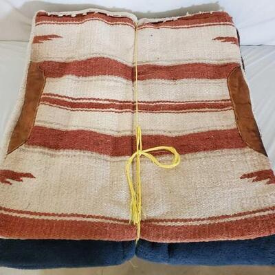 502	

Five Used Saddle Pads
Five Used Saddle Pads
sized between 29"- 32"
4 with leather wears. 