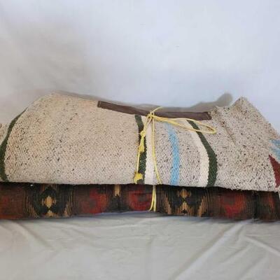 504	

Four Used Saddle Pads
Four used saddle pads:
1 Diamond Wool Saddle Pad 31"
1 Cream colored Navajo Maytex Pad
1 Navajo Multi...