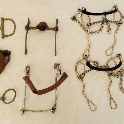 384	

9-Misc Combinations of Bits
1- D Ring Snaffle
1- O Ring Snaffle with Leather Bit Guards
1- English Bit
1- Correction Bit with...